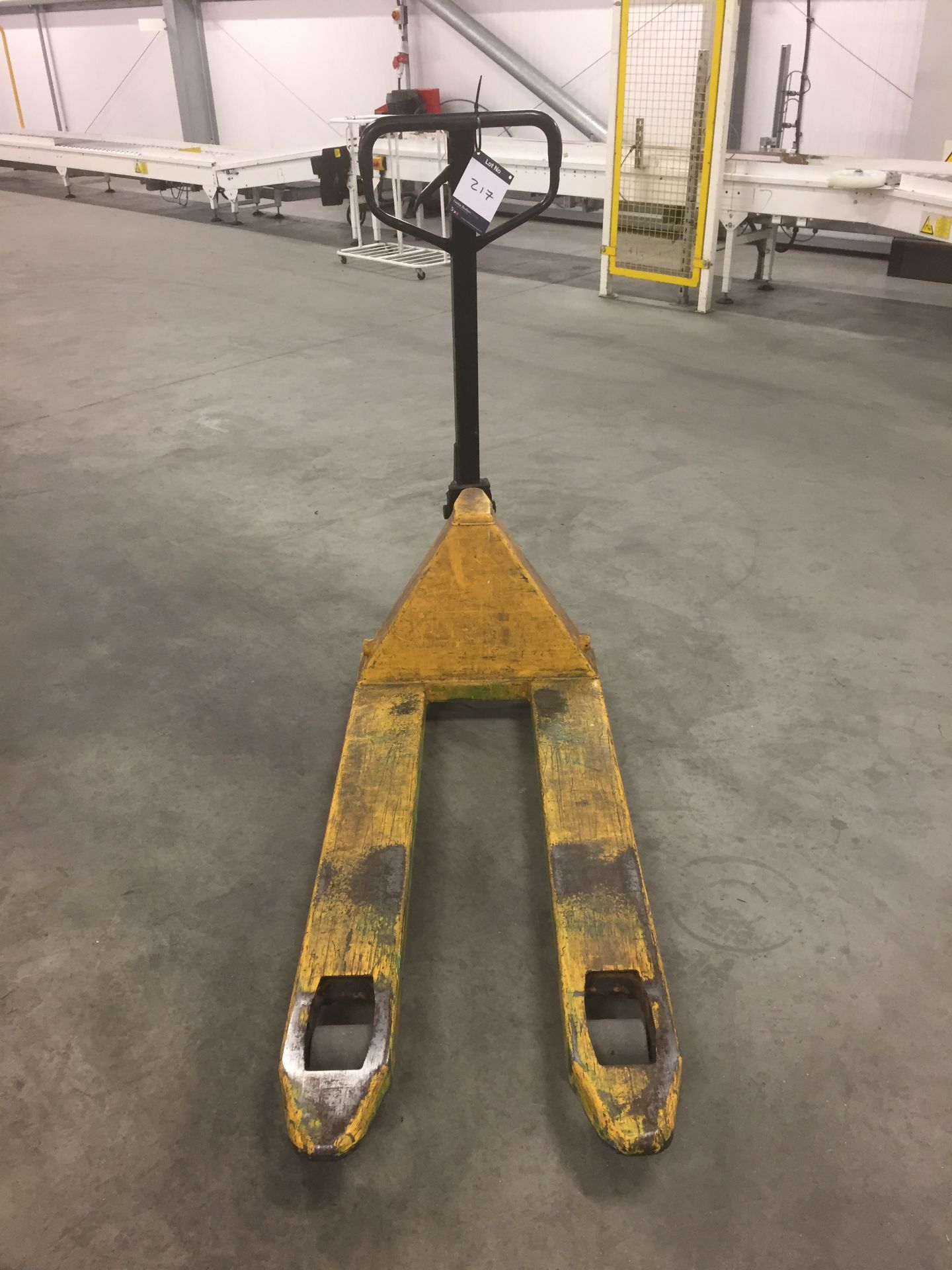 Yellow hydraulic pallet truck