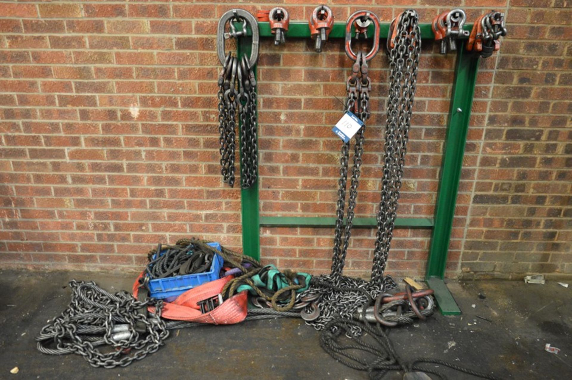 Various chains, eye hooks, straps and stand (no test information available) as lotted