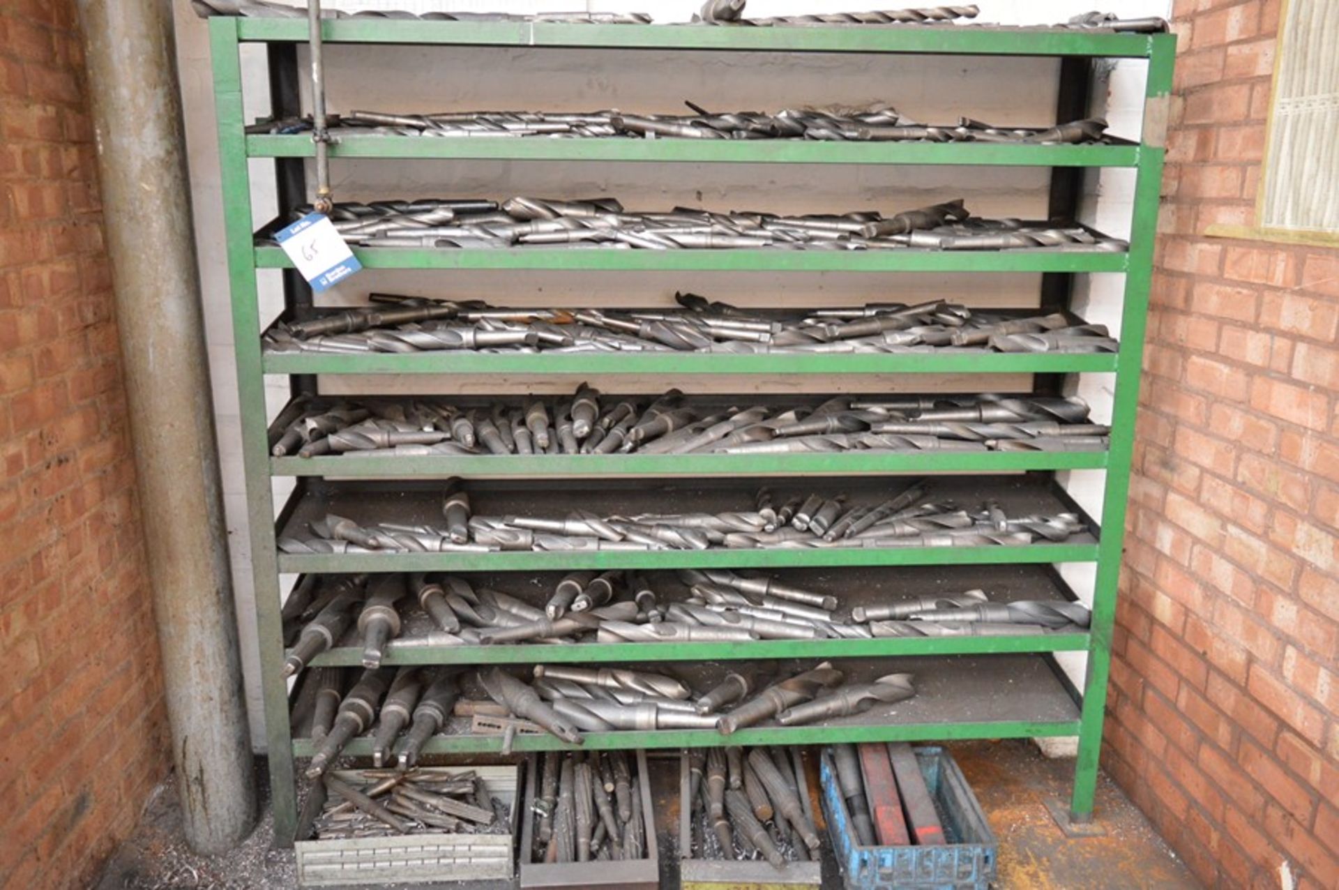 8 Tier shelf and contents to include large quantity of taper shank drill bits, various sizes, as