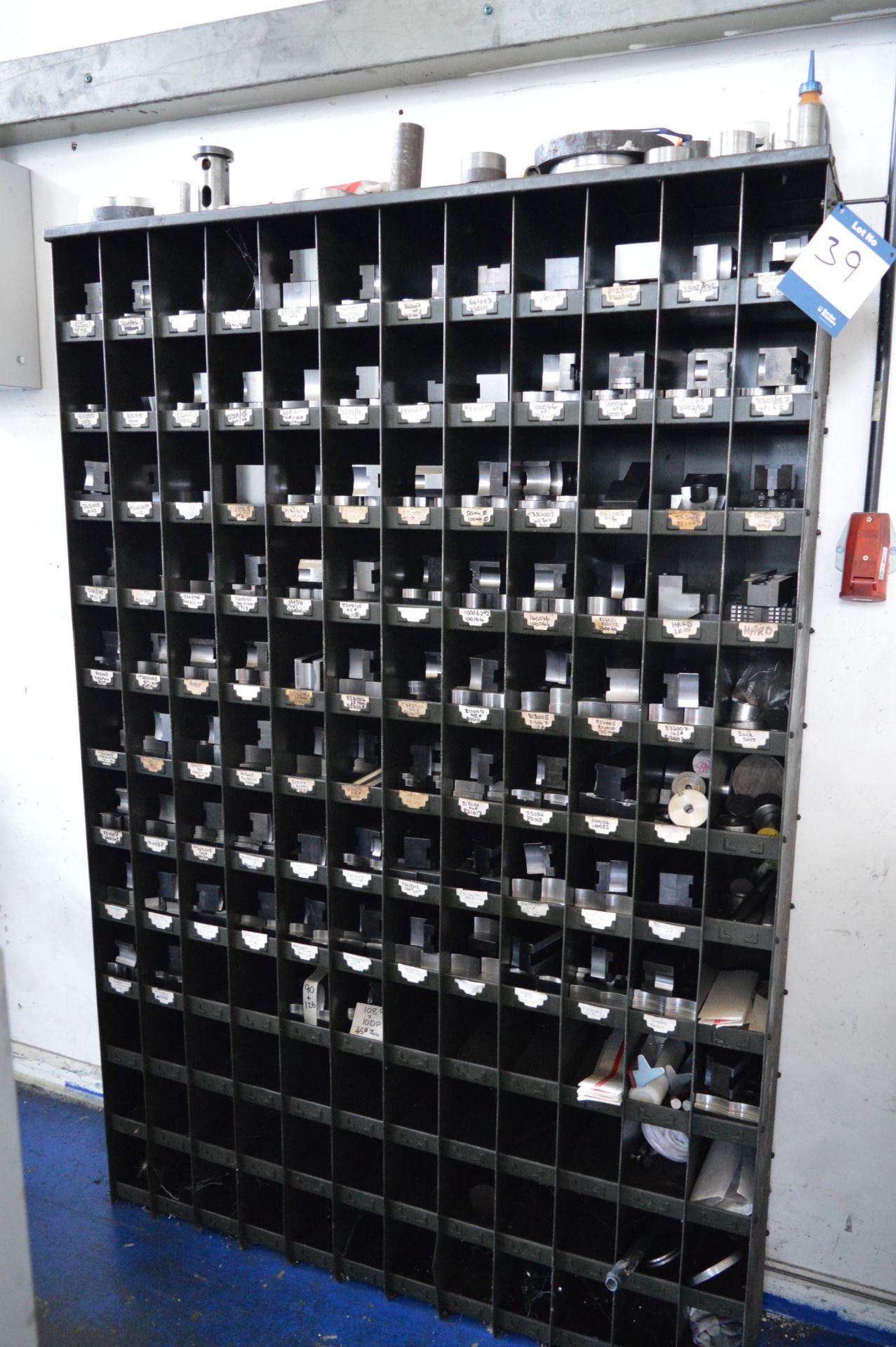 Various chuck jaws with shelving unit, as lotted