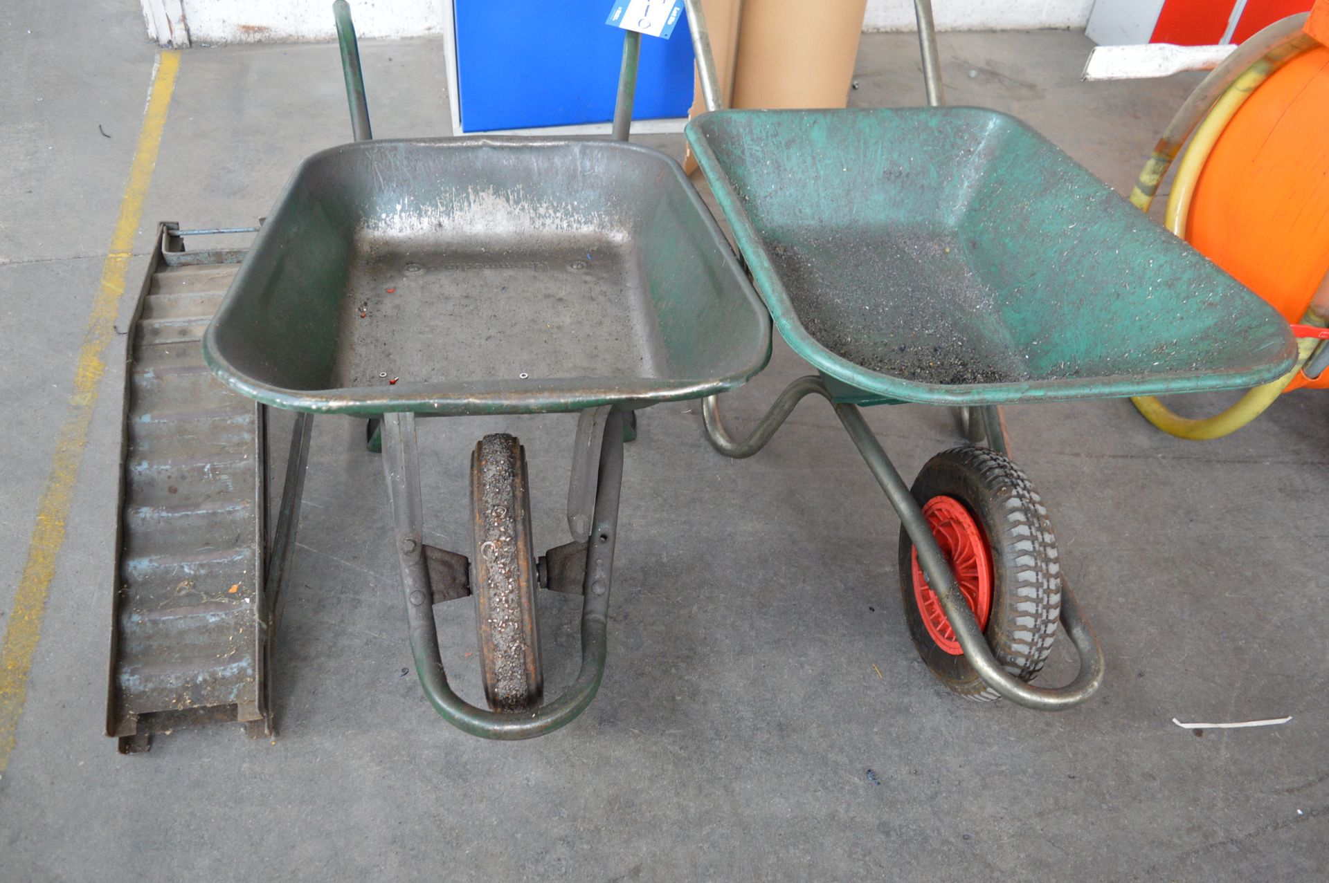 2 x wheelbarrows and pair car ramps as lotted