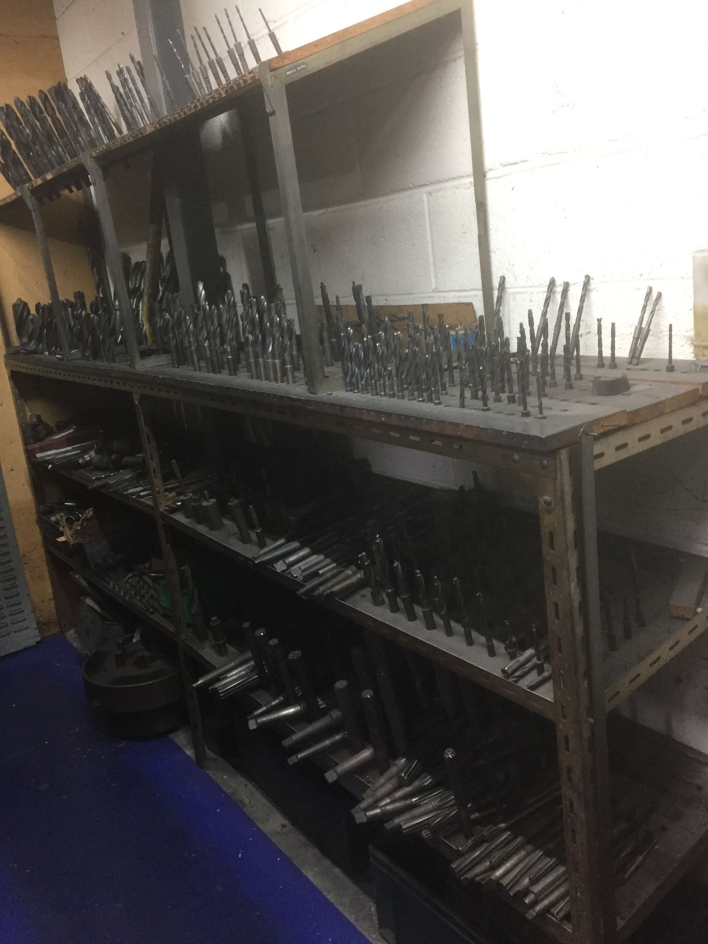 Contents of tool room including drills, reamers, collets and tool holders (includes all shelving and