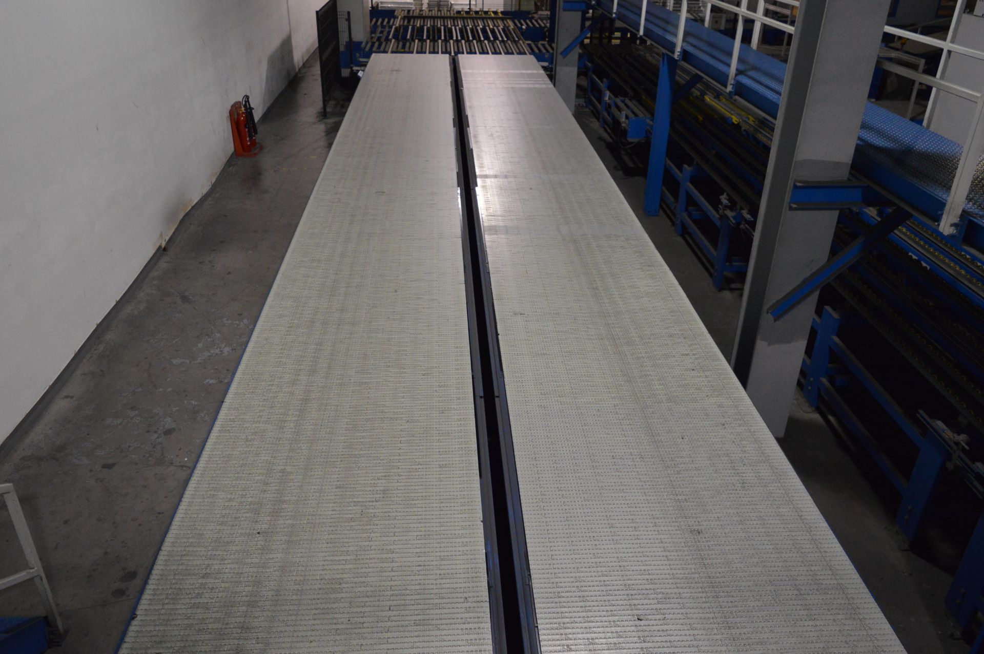2 x Kraft, modular plastic motorised conveyors (2006) Each 17m (l) x 1.4m (w) (Due to the complexity