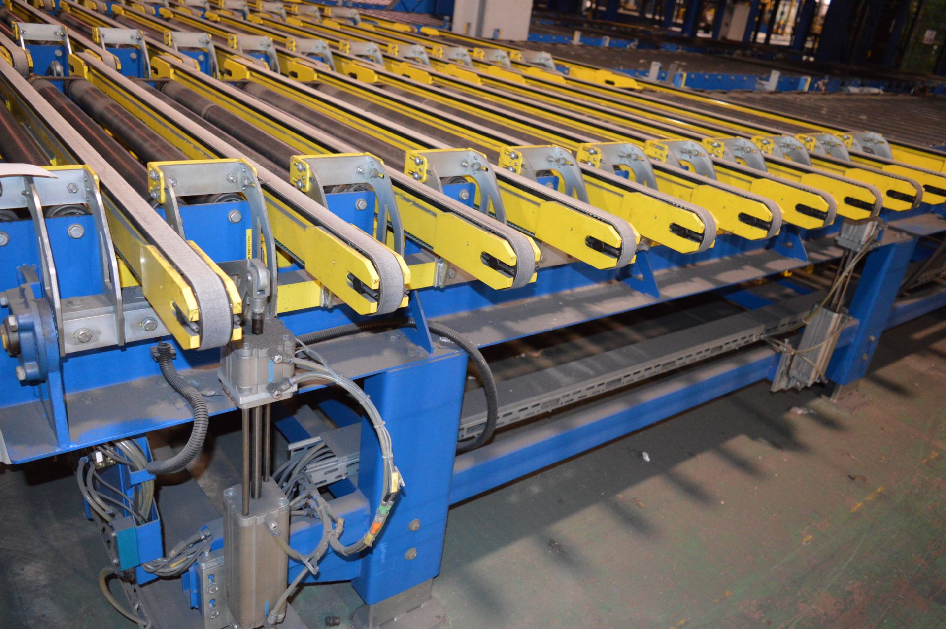 2 x Kraft, cross transfer motorised conveyors with outfeed rollers (2006) Each 4.7m (l) x 1.75m (