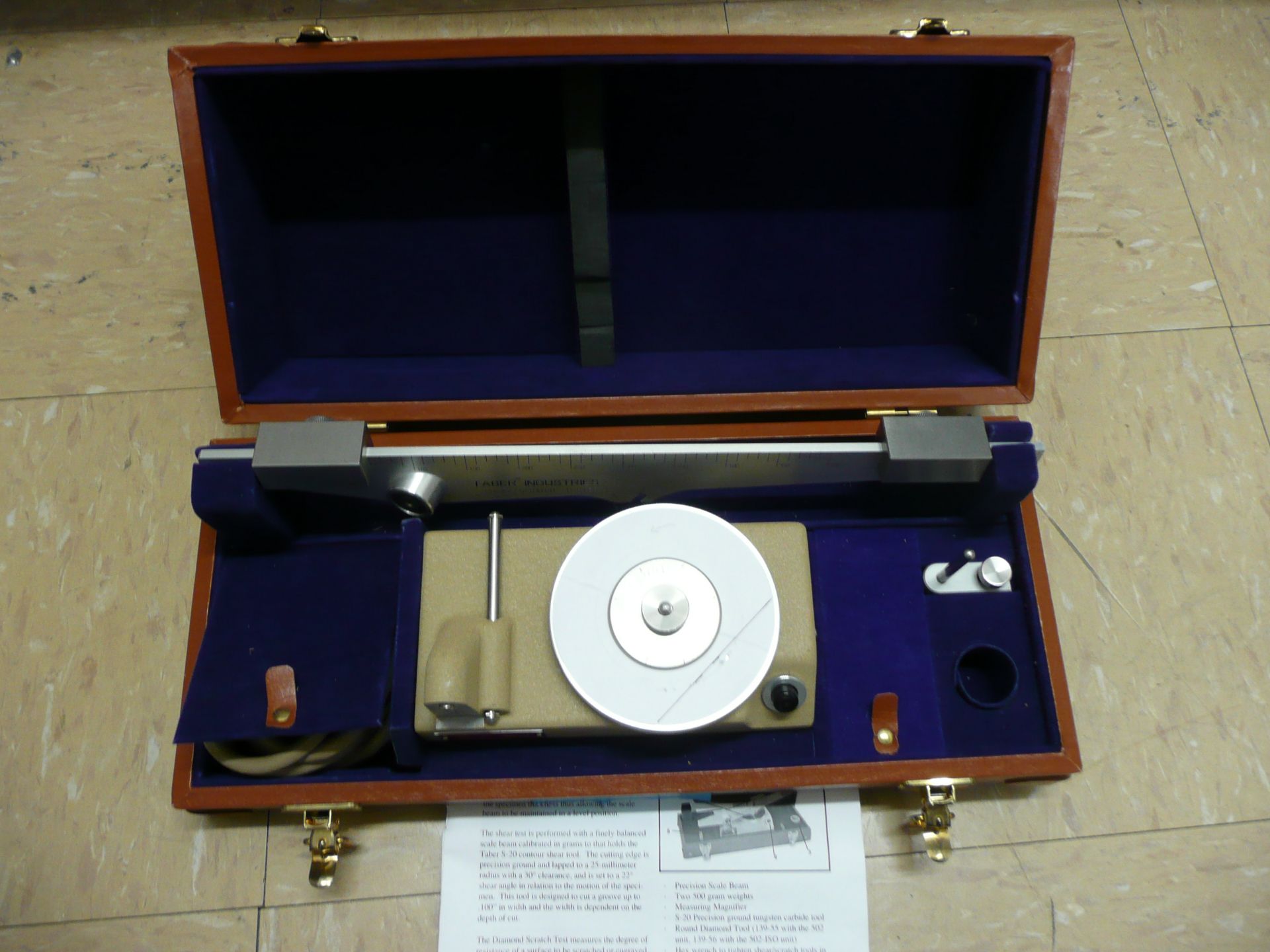 Taber, 502 shear/scratch tester with precision scale beam, specimens size should be 4" x 4" x ¼" max