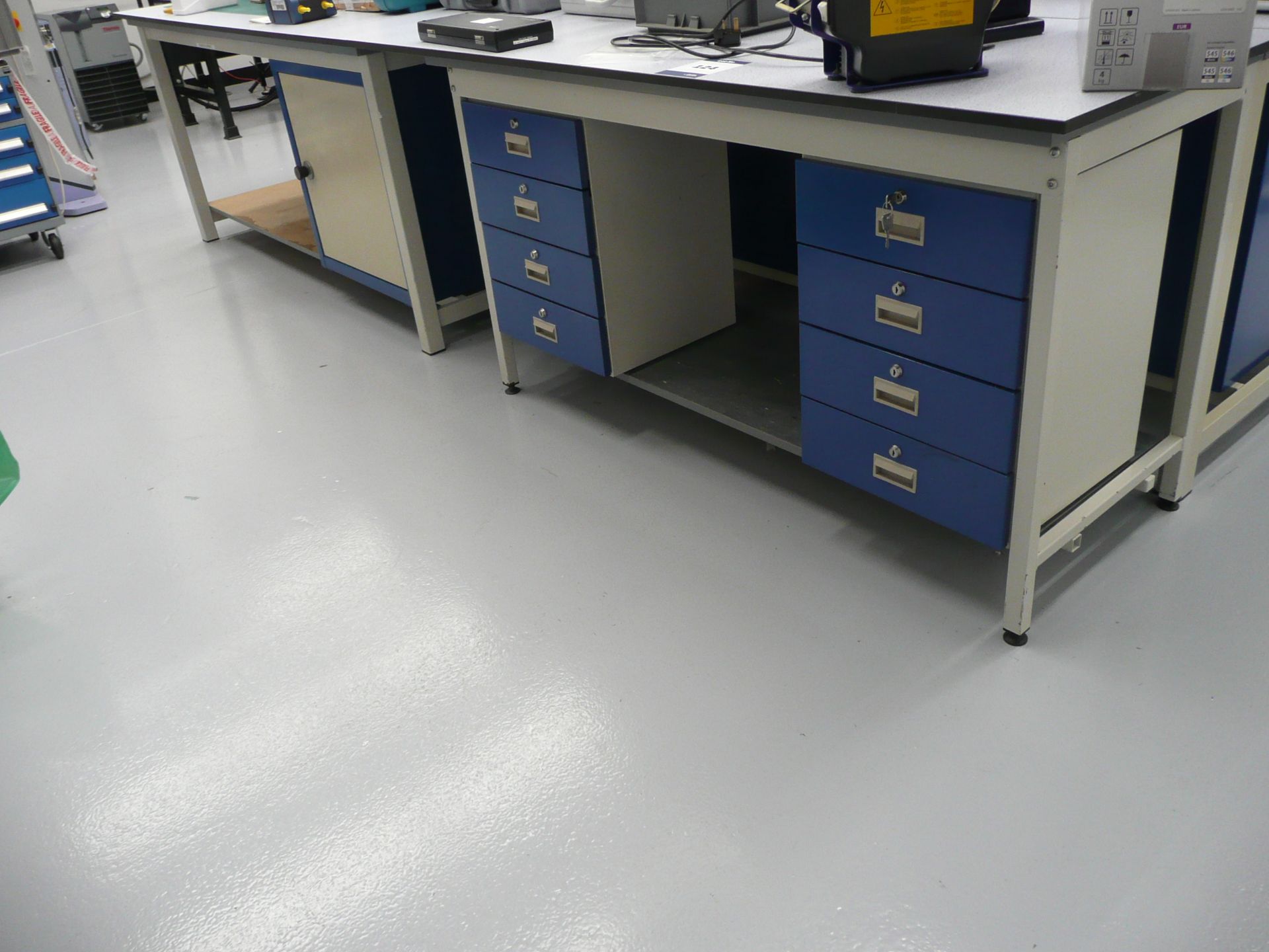 4 x work benches, two with twin multi drawer hanging cabinets and one with storage cupboard Size (