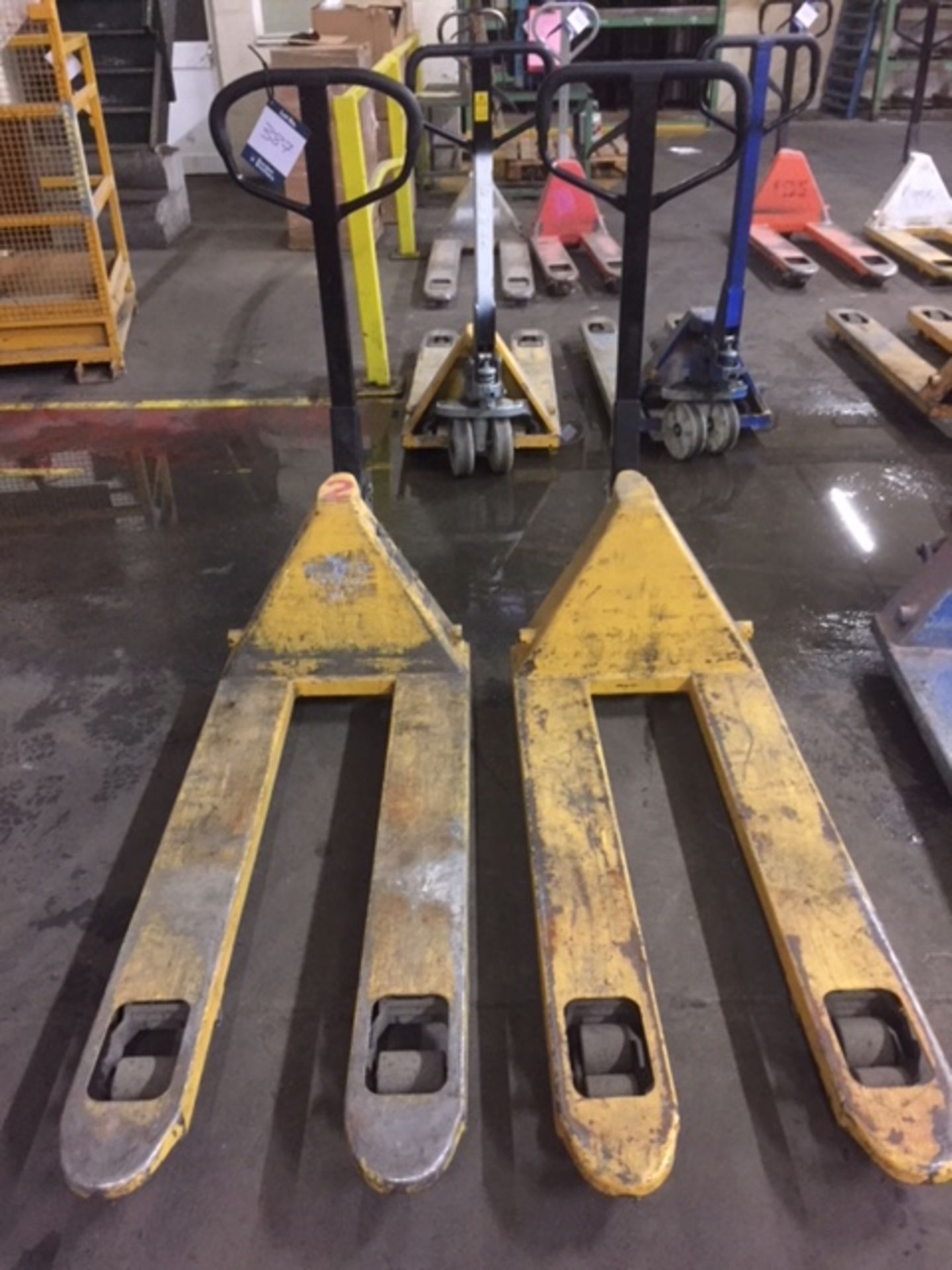 Two hydraulic pallet truck **This lot is located at The Willows Site, CF48 1YH**