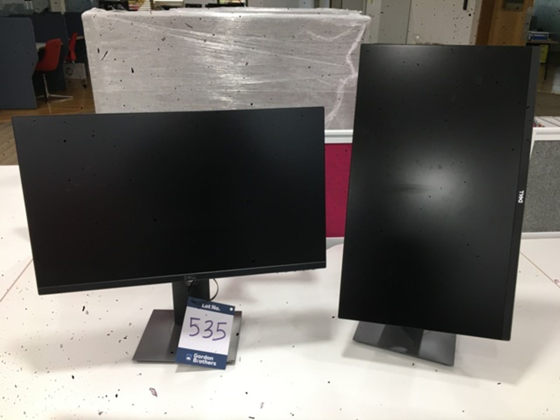 Two Dell P2419H 24" full high definition LED monitors mounted on height adjustable / rotatable
