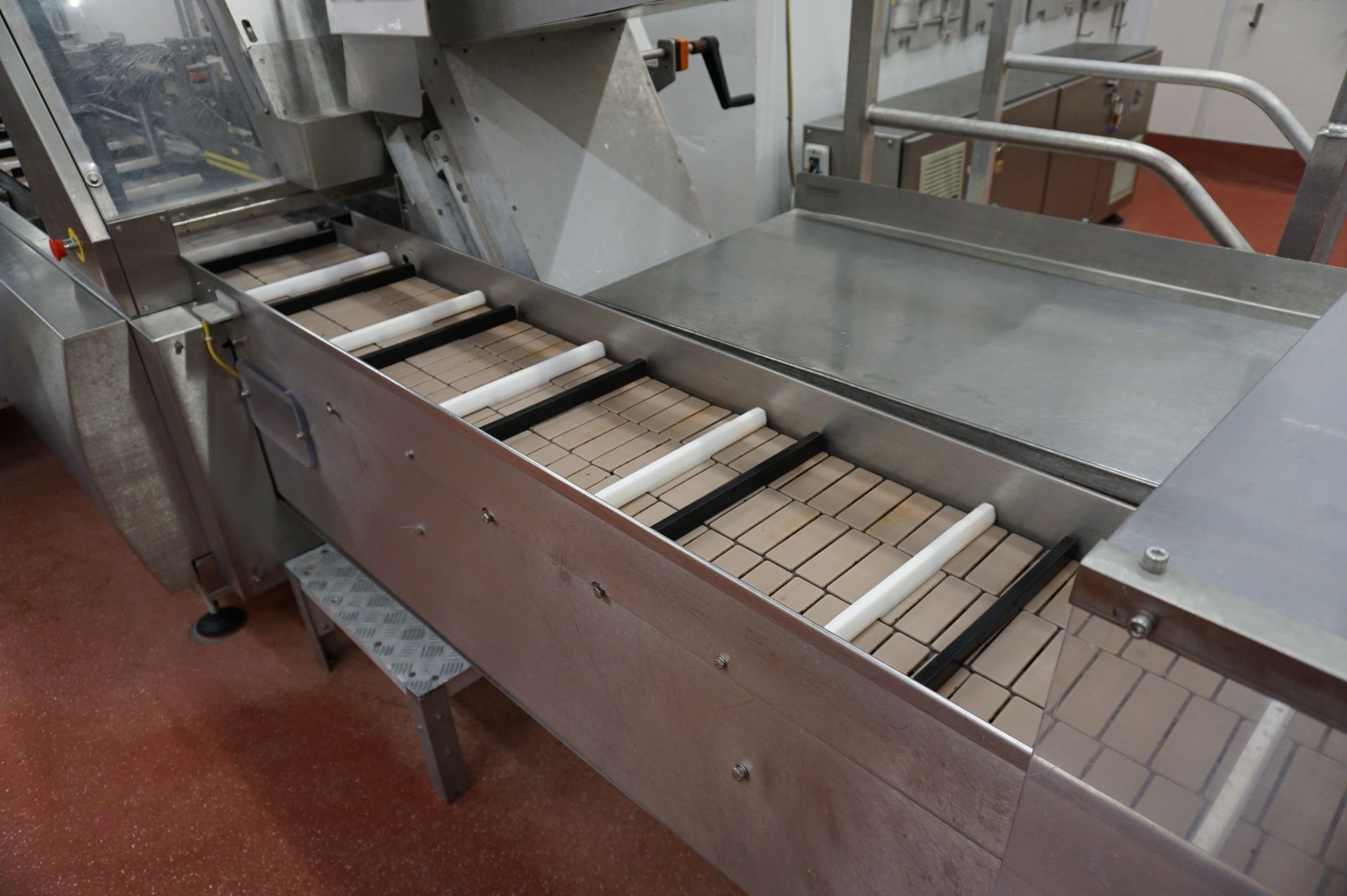 Bradman Lake Packaging Station Comprising: curved plastic slat decline conveyor to motorised - Image 6 of 16