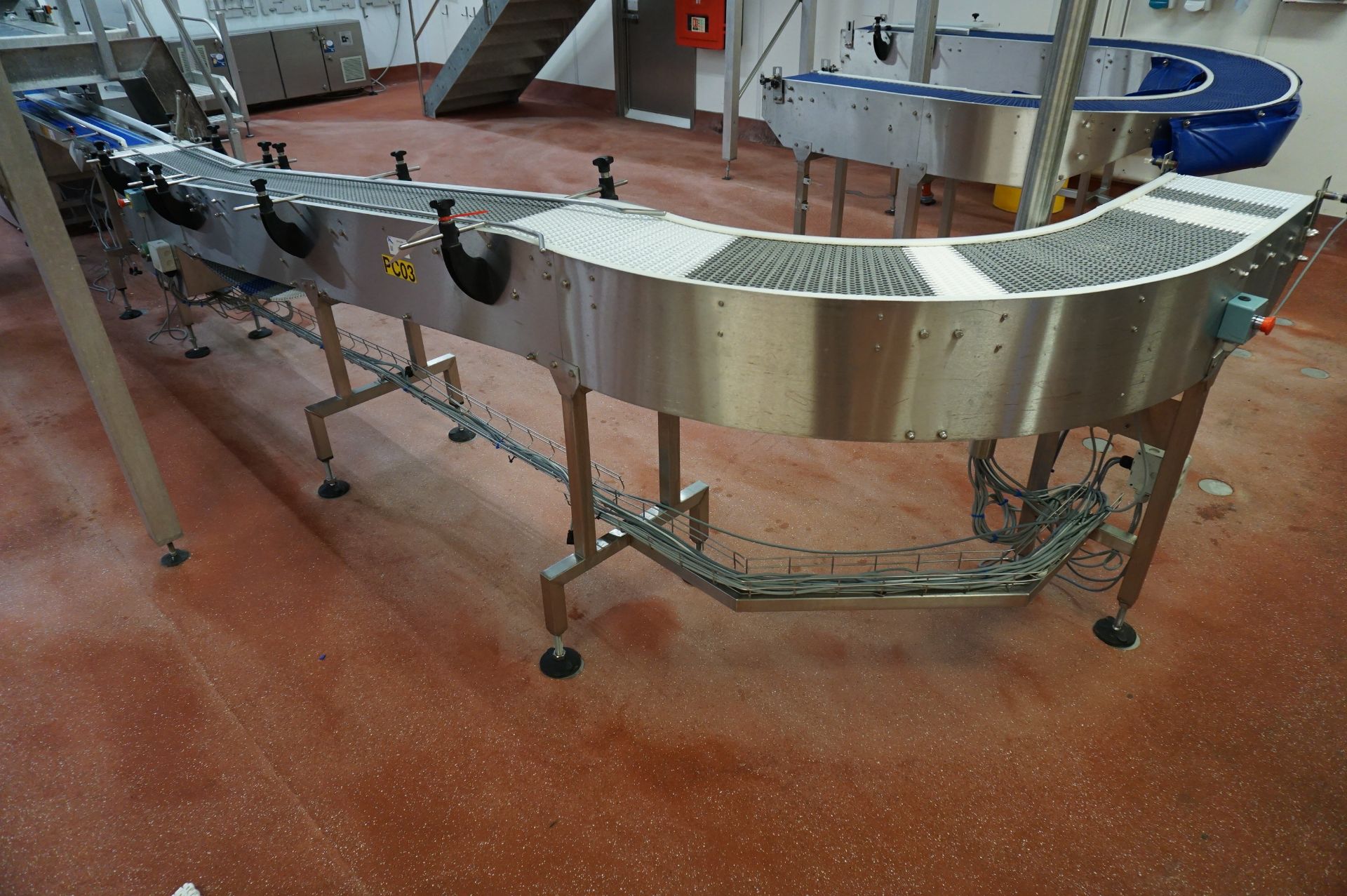 Bradman Lake Packaging Station Comprising: curved plastic slat decline conveyor to motorised - Image 2 of 16