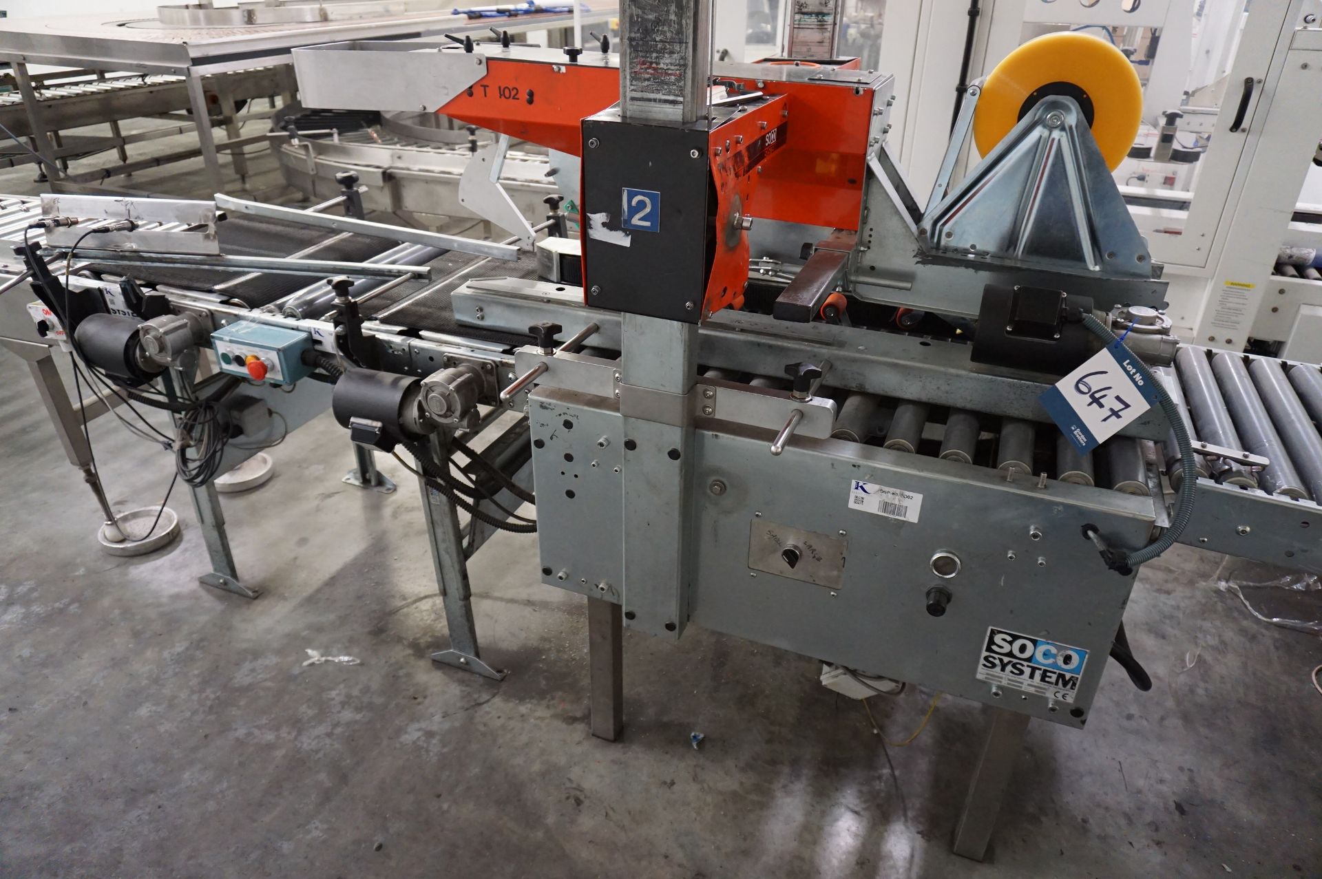 Soco System, Model: T402 box taping machine, Serial No. N/A (2000) with infeed/outfeed conveyor