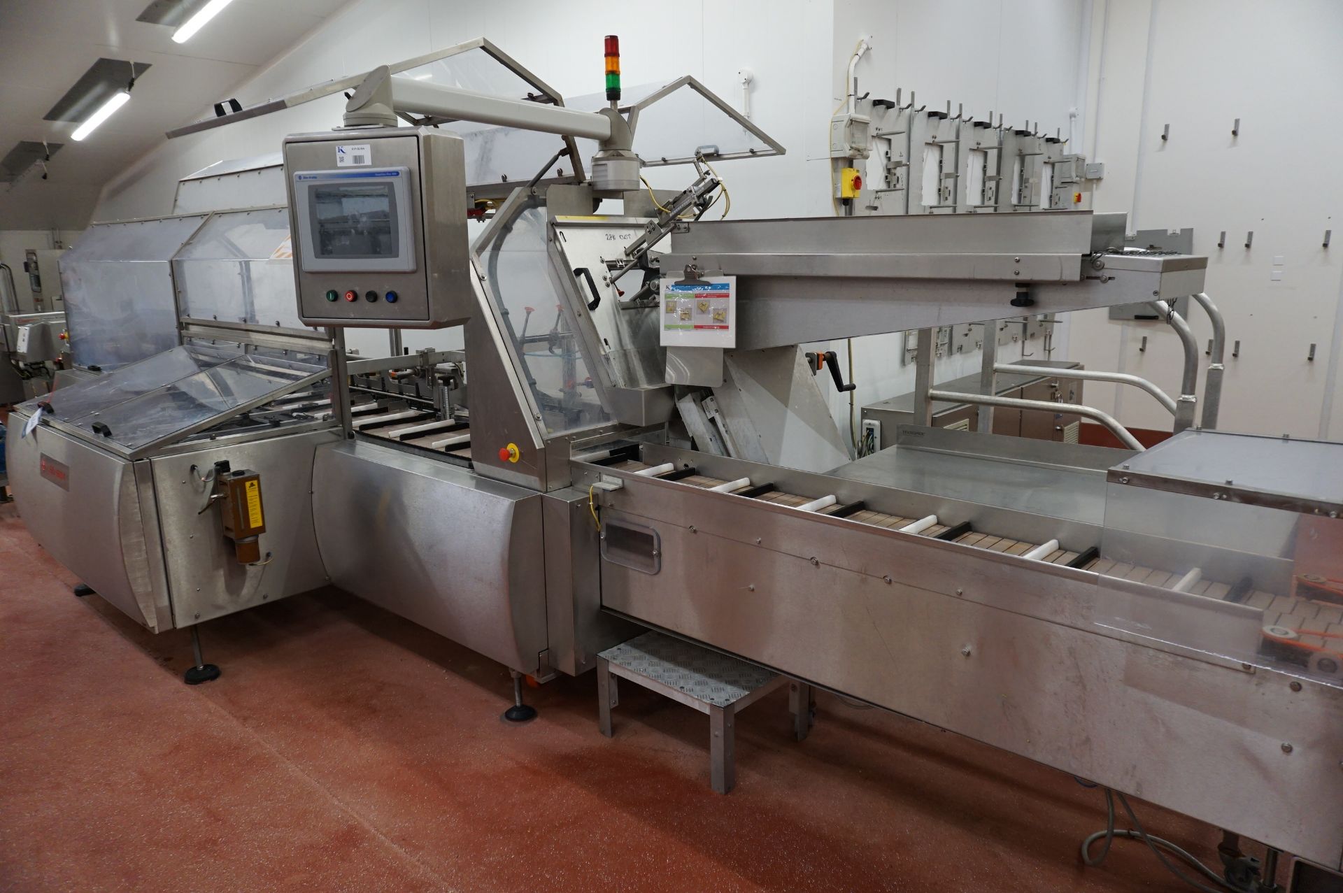 Bradman Lake Packaging Station Comprising: curved plastic slat decline conveyor to motorised - Image 5 of 16