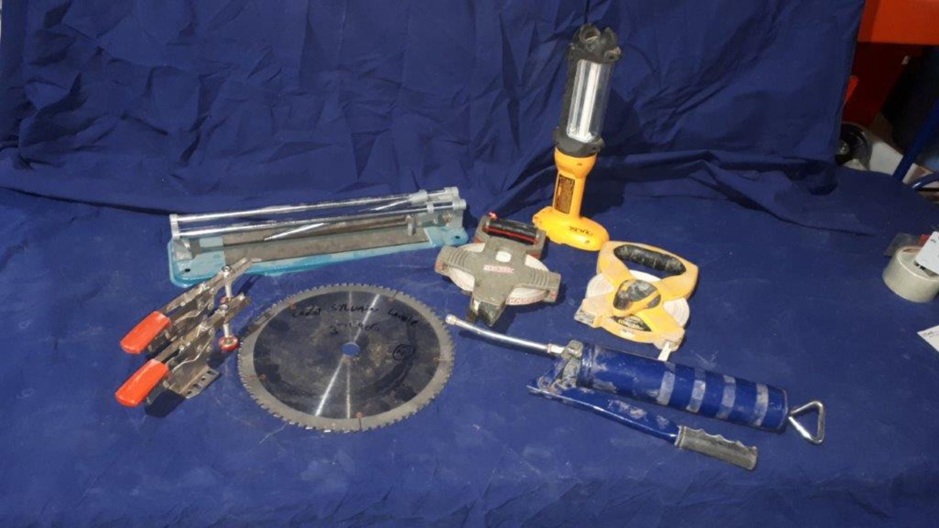 LOT: Clamps, Tile Cutter, Tape Measures, Saw Blade, Lamp, Grease Gun