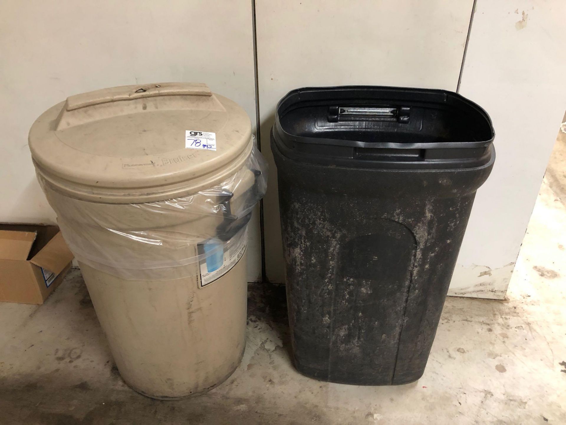 Two Plastic Trash Cans