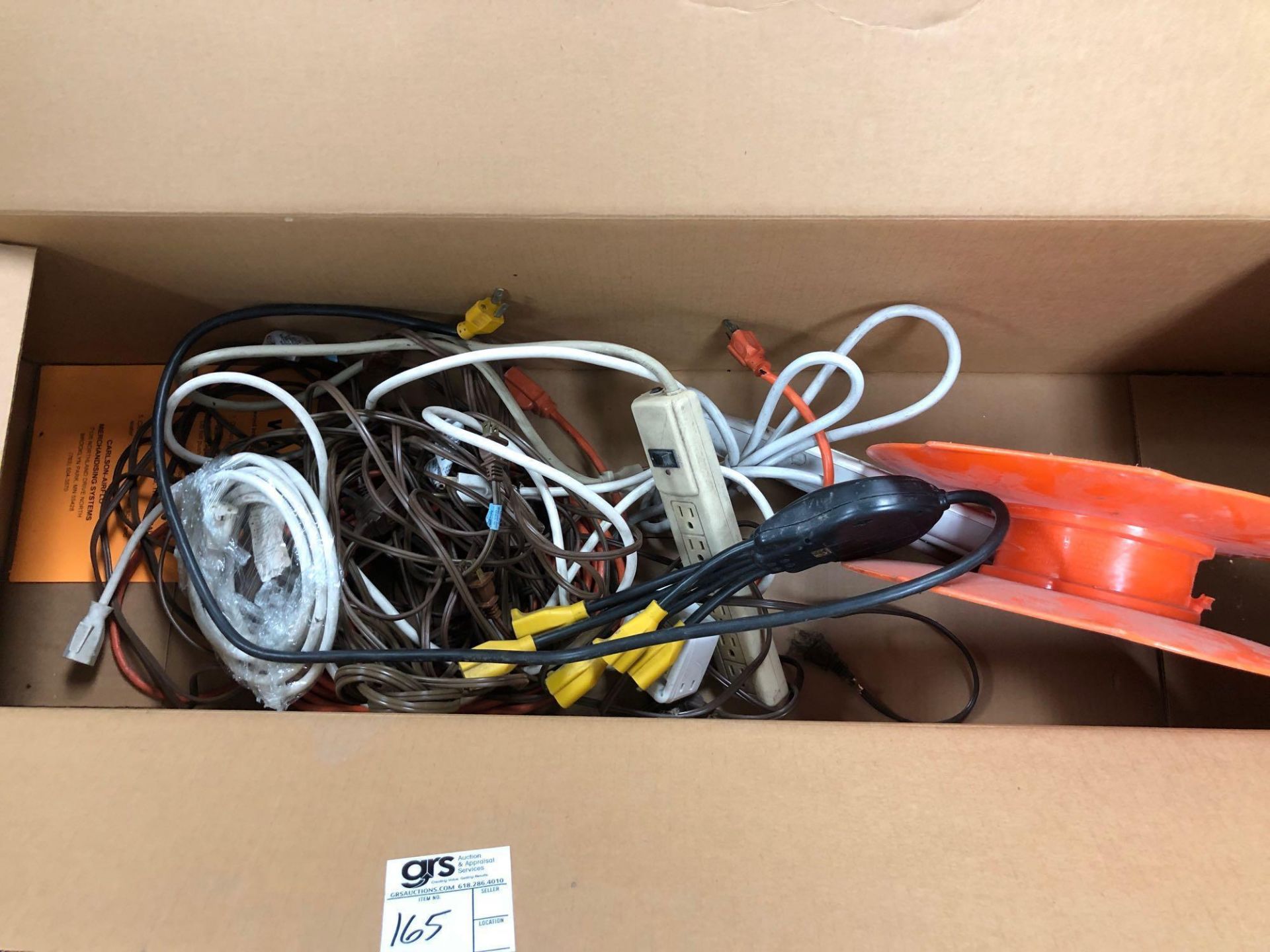 Box of Extension Cords and Surge Protectors