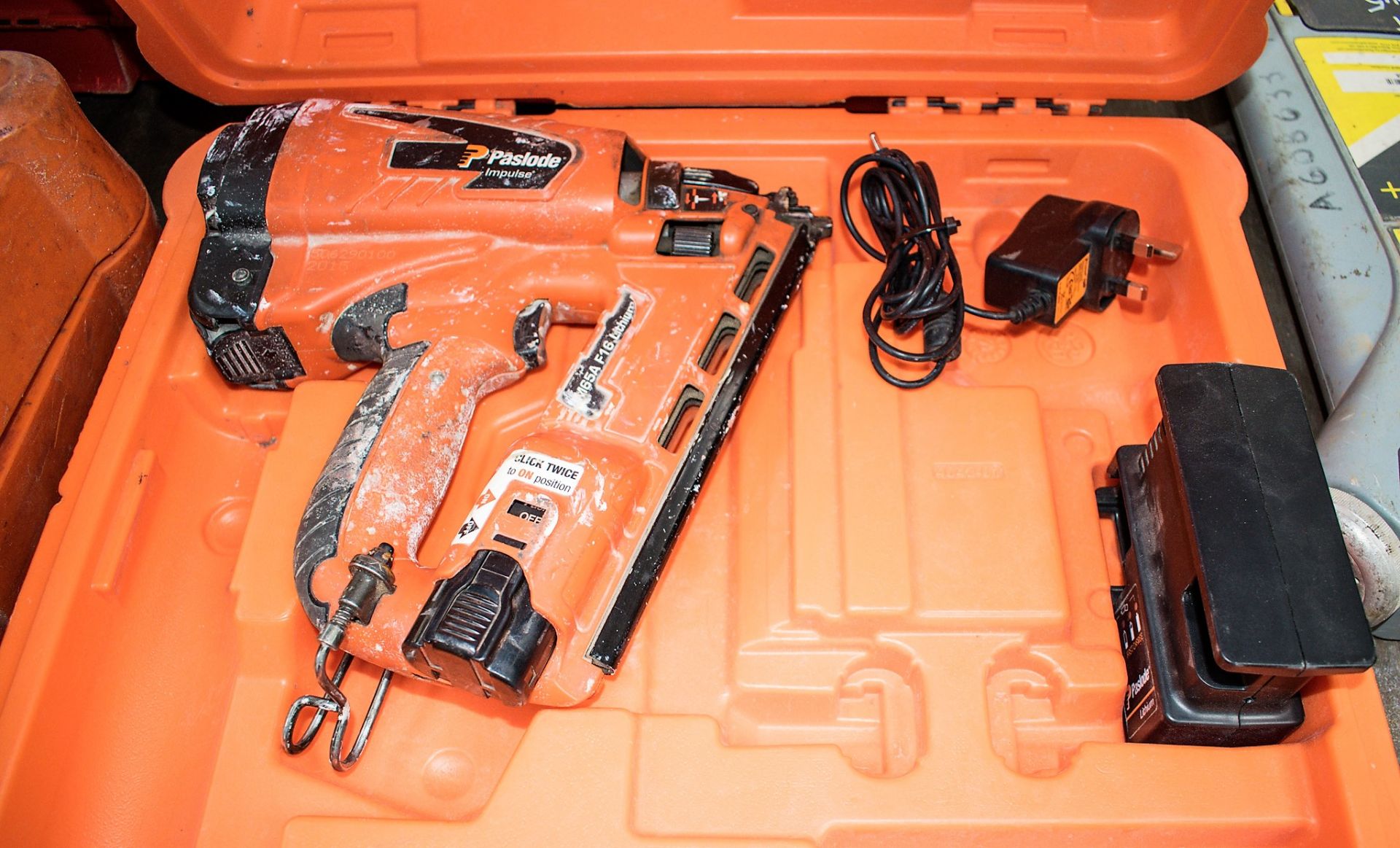 Paslode IM65A cordless nail gun c/w charger, battery & carry case A692081