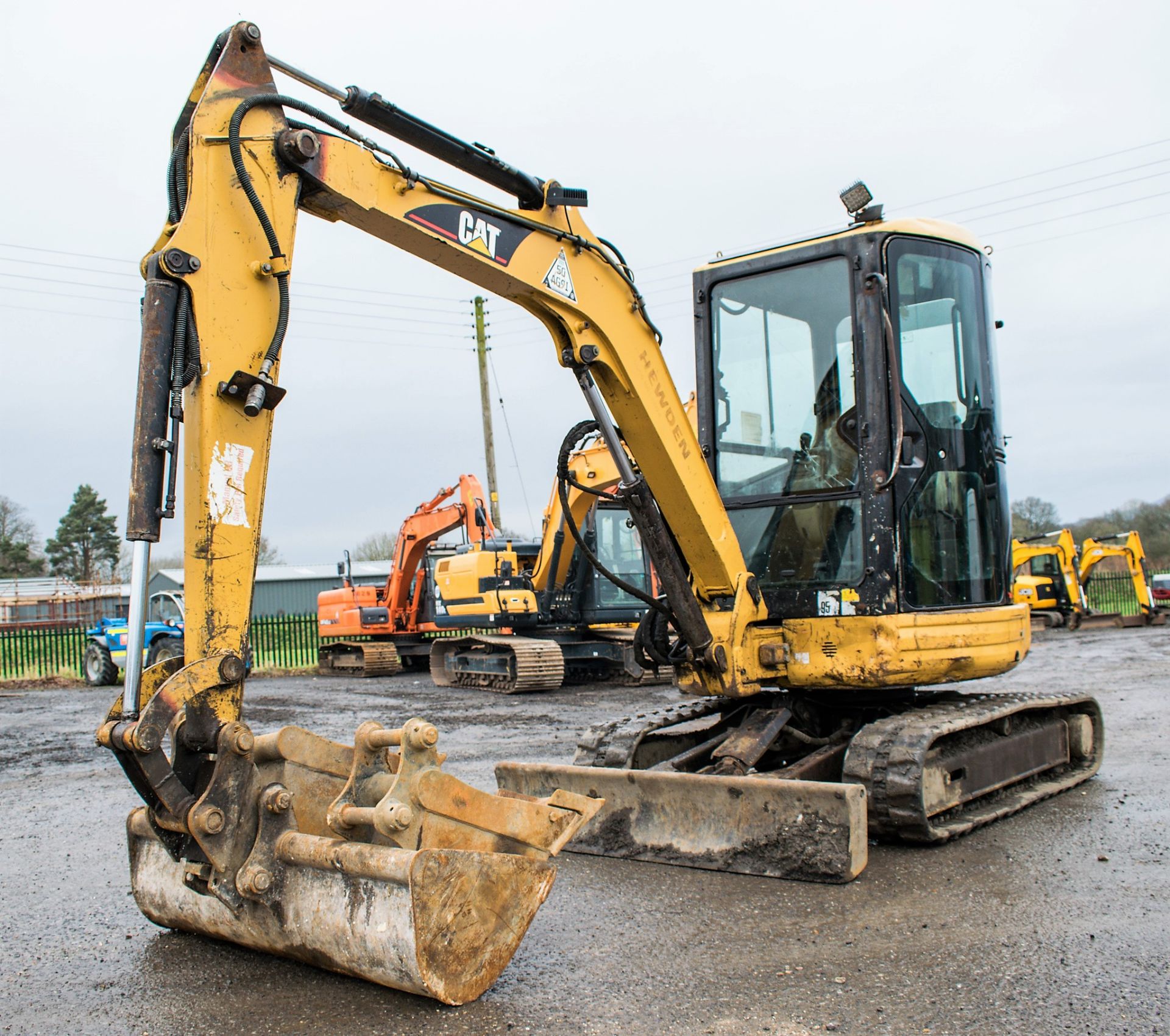 Caterpillar 303 CR 3 tonne zero tail swing rubber tracked excavator Year: 2005 S/N: 107961