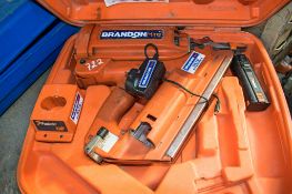 Paslode cordless nail gun c/w battery, charger & carry case