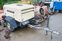 Doosan 7/20 diesel driven mobile air compressor Year: 2012 S/N: 123304 Recorded Hours: 331 A577151