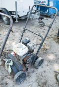 Petrol driven lawn scarifier ** Wheel missing **