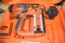 Paslode IM65 cordless nail gun c/w charger & carry case A534752 ** No battery **