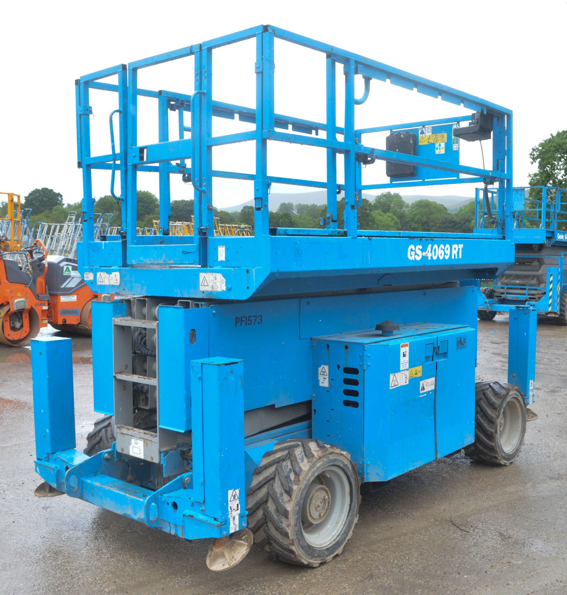 Genie GS4069 RT 4 wheel drive diesel driven scissor lift  Year: 2013 S/N:6912-456 Rec hours: 1621