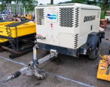 Doosan 7/125 10/110 diesel driven 4 tool mobile air compressor Year: 2014 S/N: EY660024 Recorded