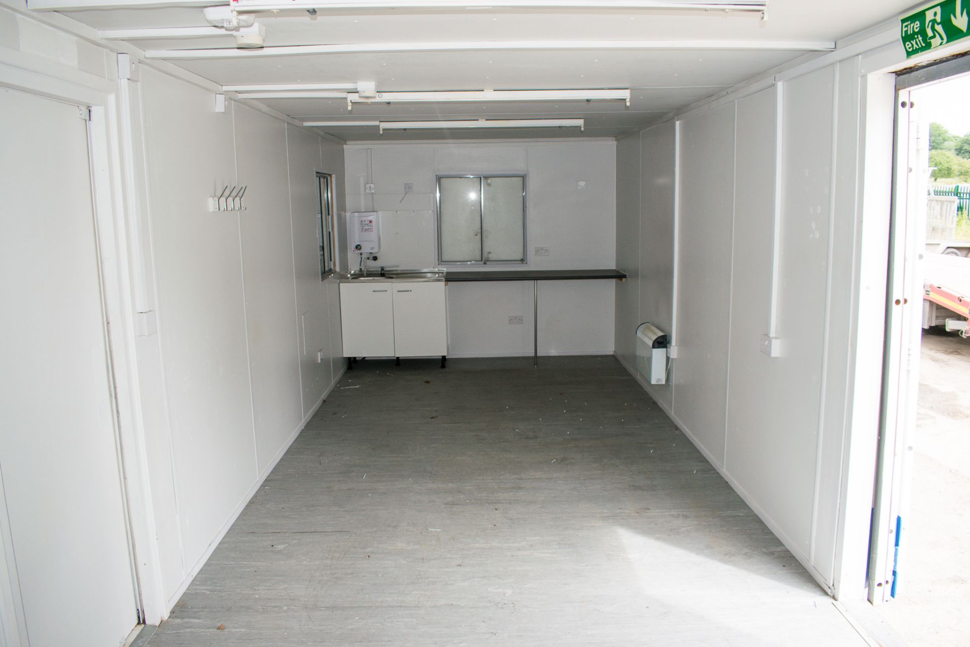 32 foot by 10 foot anti vandal steel open plan office unit  c/w sink unit and worktop at one end and - Image 7 of 8