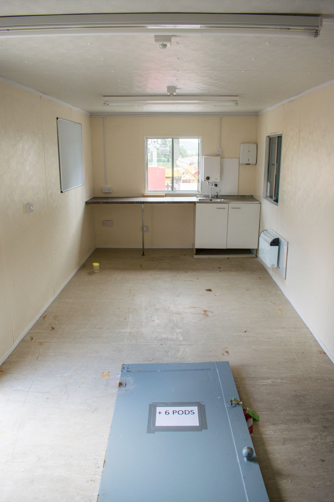 32 foot by 10 foot anti vandal steel site office  c/w sink unit and work top and hangers and bench - Image 10 of 10