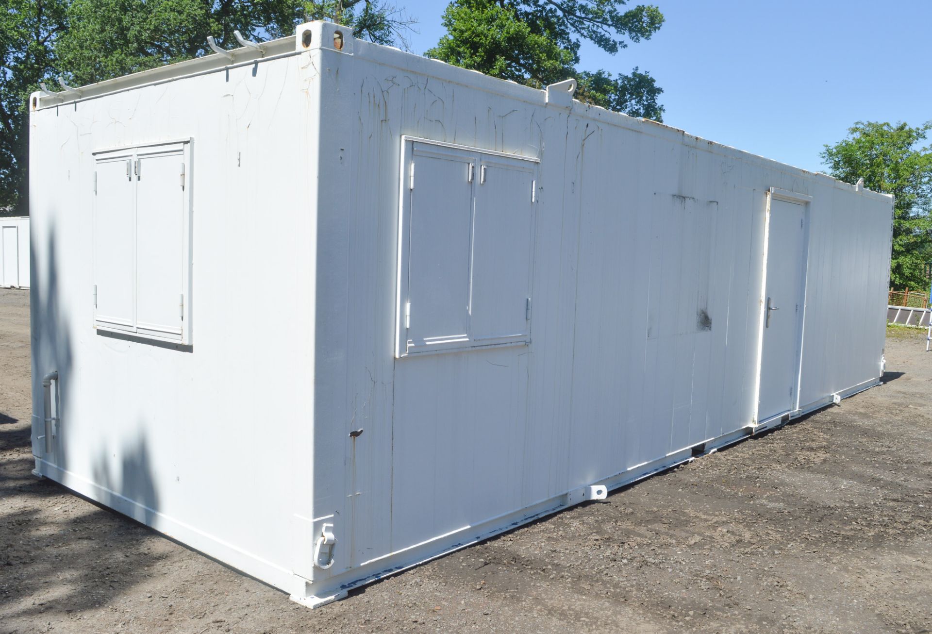 32 ft x 10 ft steel anti vandal site unit Comprising office and kitchen  c/w keys in office  BBA1703