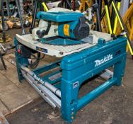 Makita LF1000 110v flip over saw