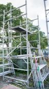 Aluminium scaffold tower comprising; 8 end frames 10 cross beams 4 wheeled feet 2 staging boards