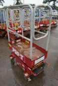 Pop-up battery electric push along scissor lift