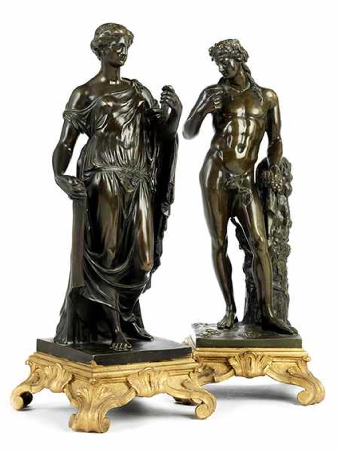 Paar Bronzefiguren der antiken Göttergestalten Dionysos und Nike Gesamthöhe: je 41 cm. Frankreich,