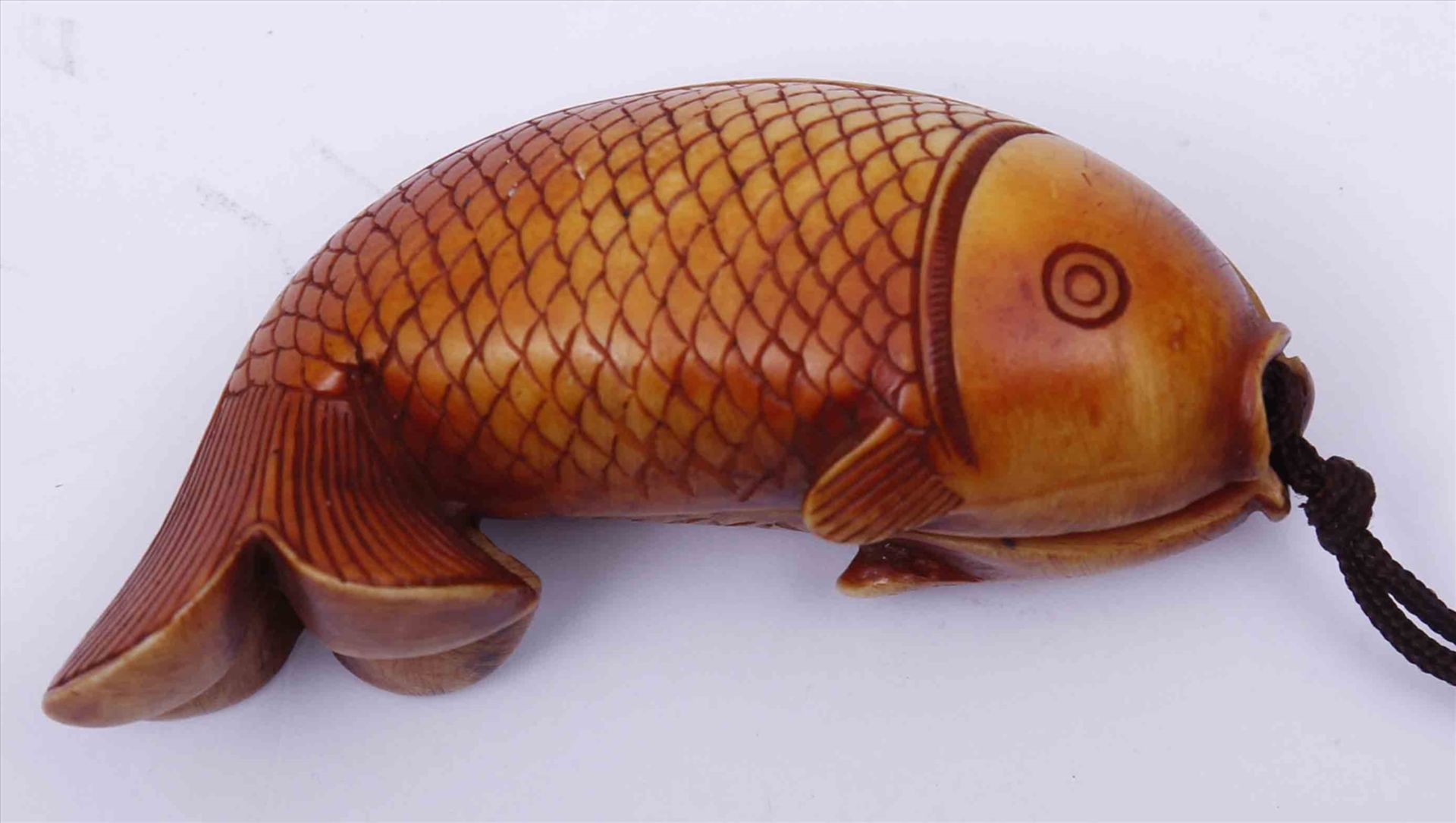 zurückgezogenShunga-Netsuke, possibly Japan, ca. 1920, fish, inside 2 couples, ivory, stained, L: