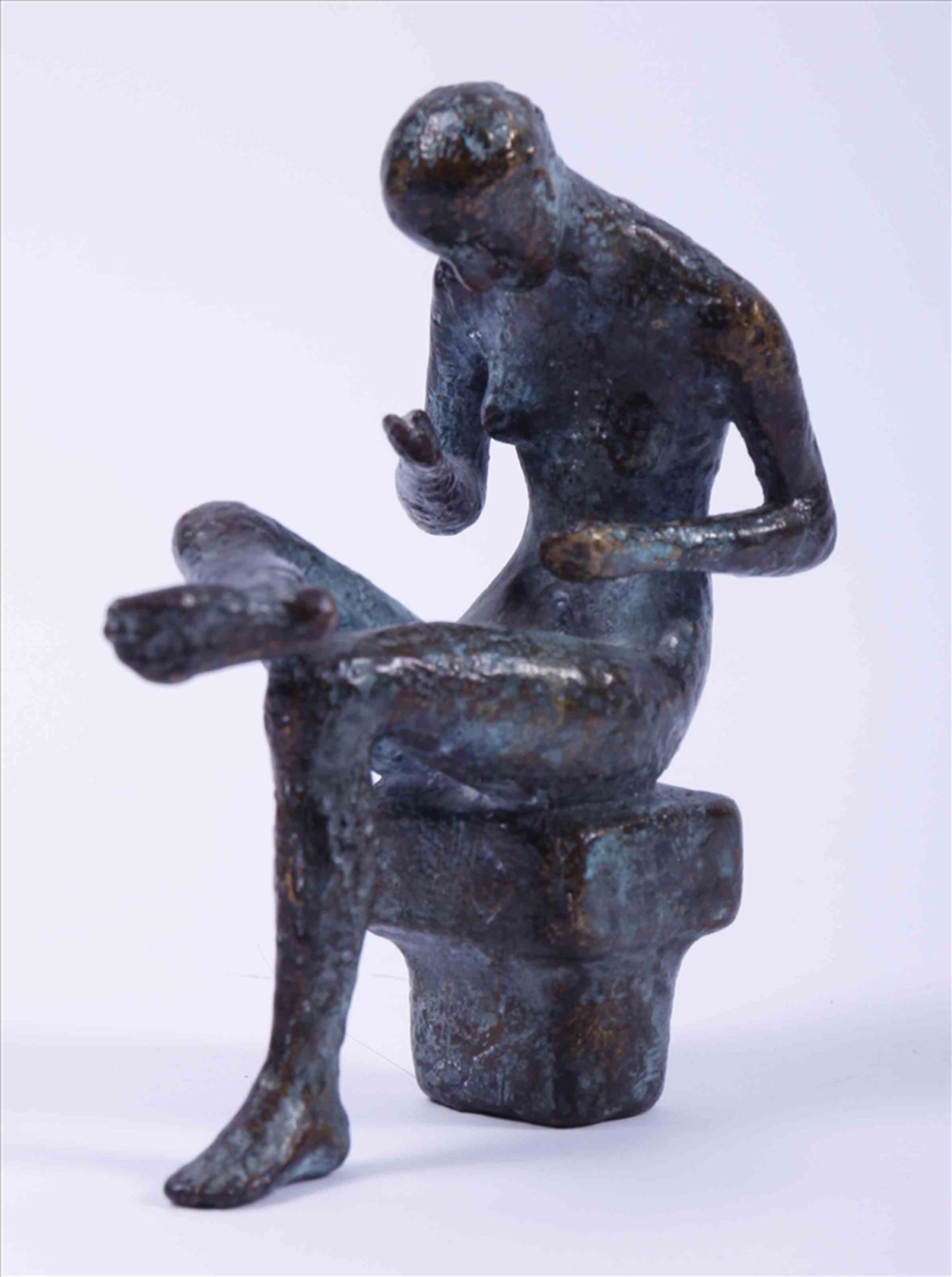 zurückgezogenSmall, seated woman, bronze, partially patinated, signed and dated (19)92 verso, H: