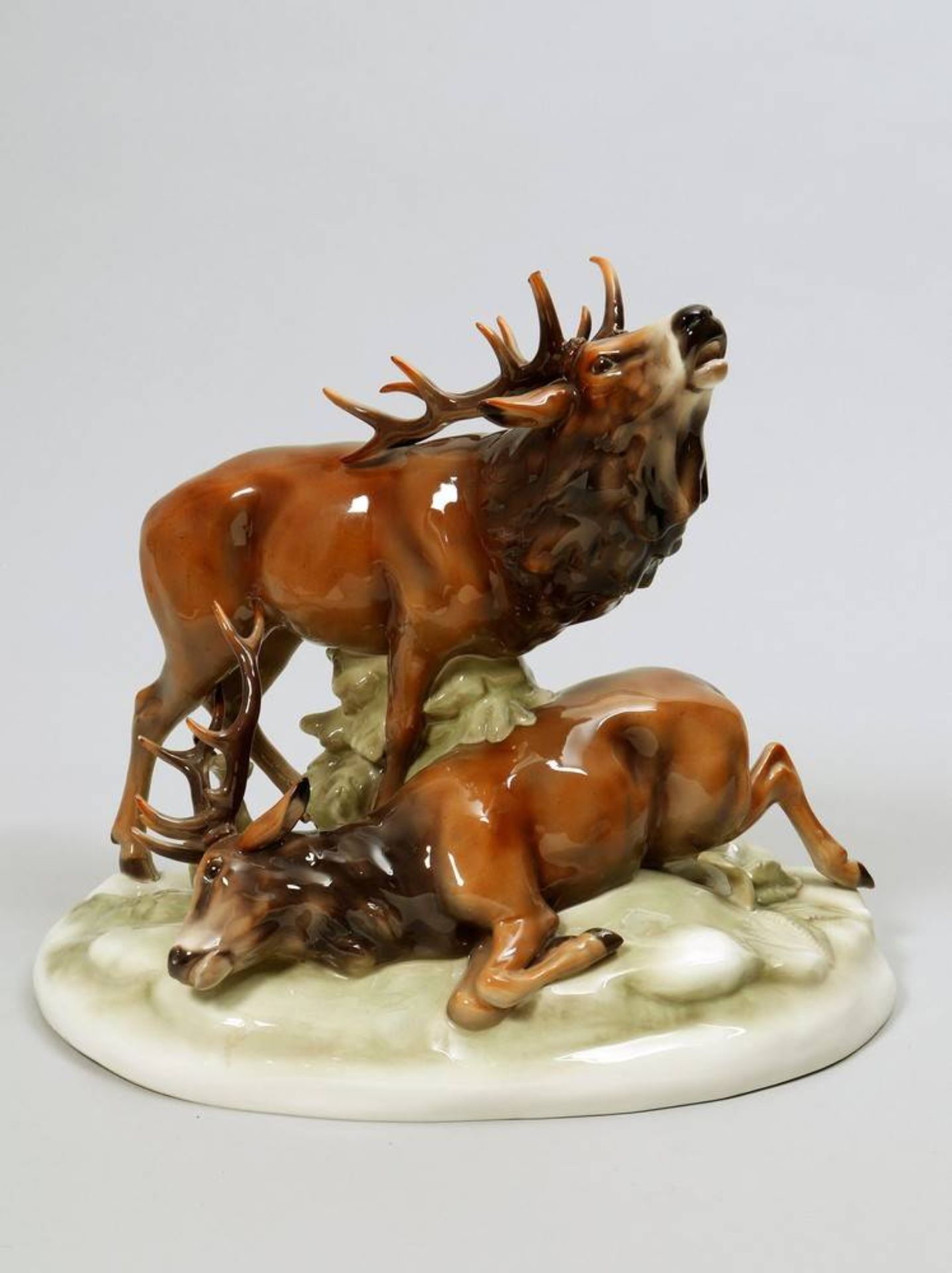Figural group Schierholtz, Plaue, 1st half 20th C., 2 deer, H: 31cm, antler chippedHirschgruppe,