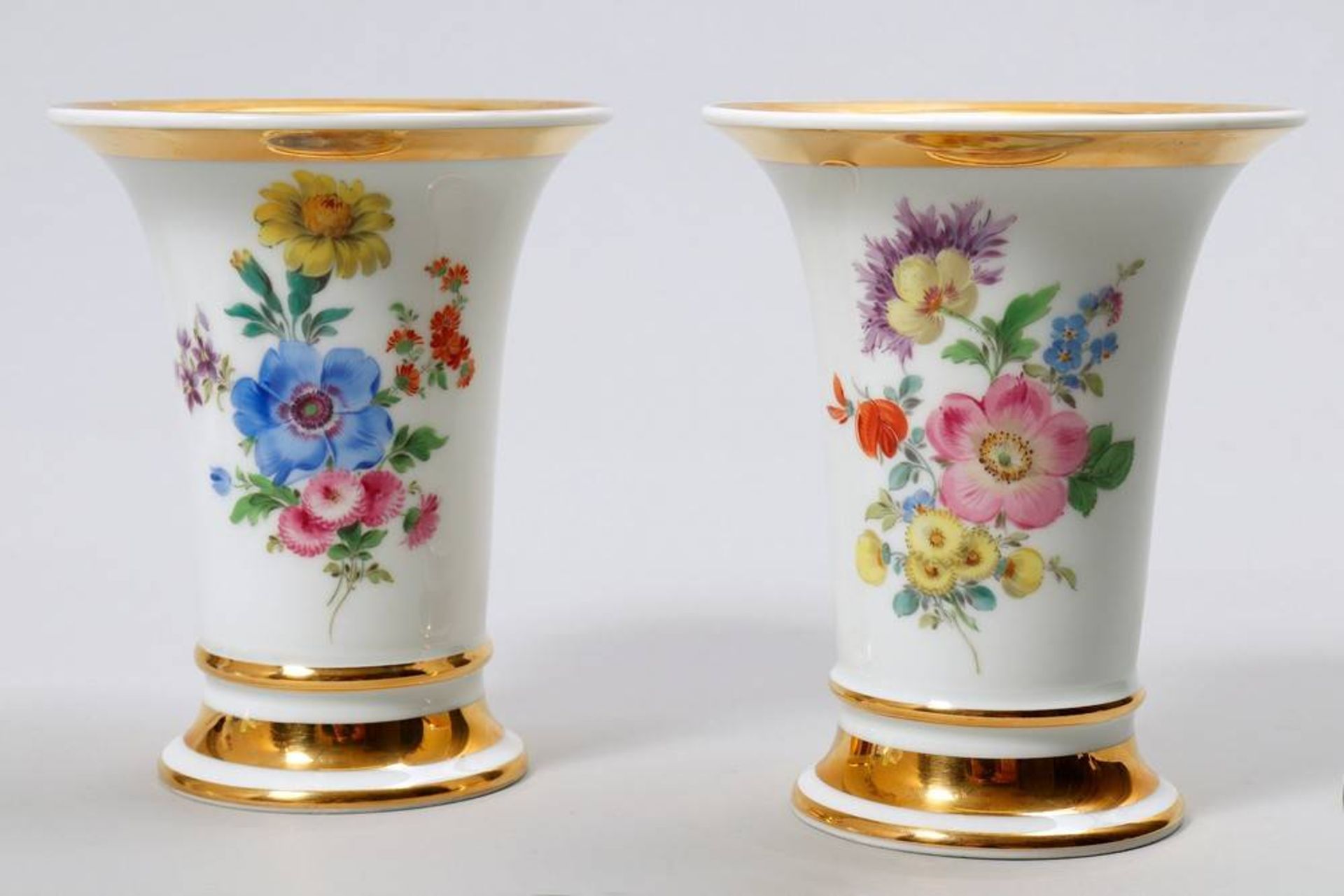 Pair of vases Meissen, 20th C., floral- and gilt decoration, sword marks, H: 14cm, minor signs of
