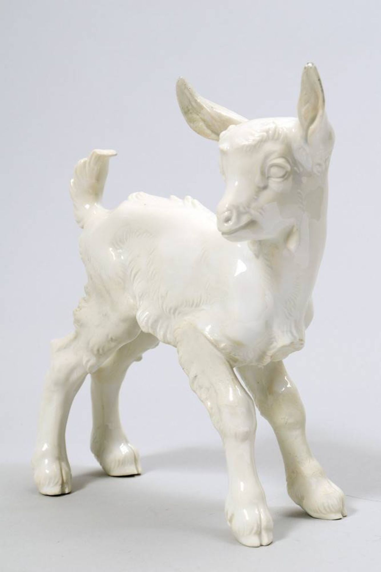 Standing goat Allach, 1933-45, porcelain, pressmark, no. "108", H: 15cm, extensively restored,