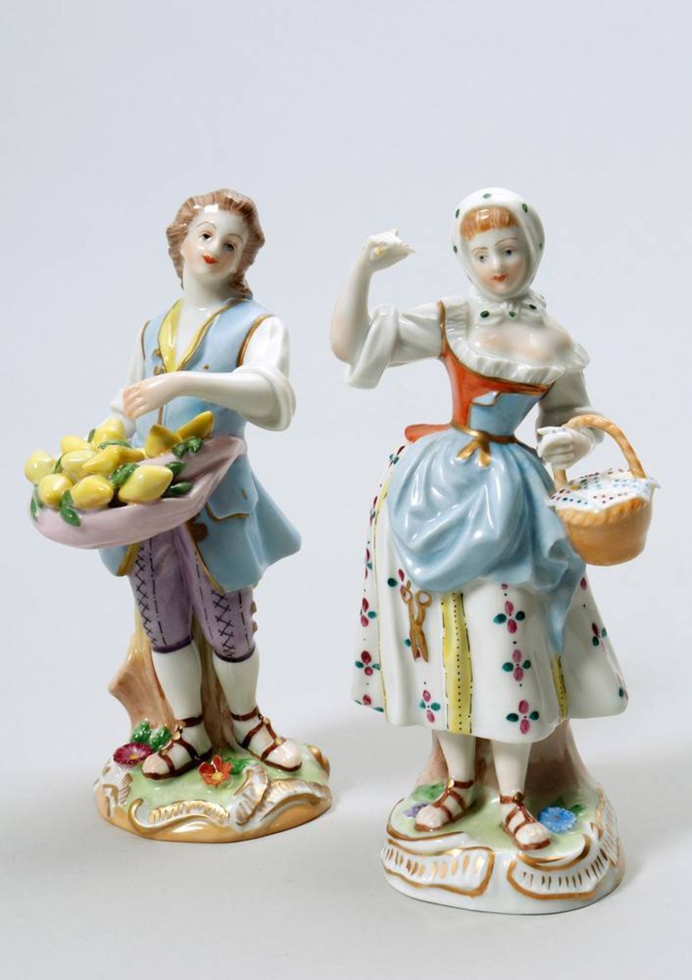 2 Cris de Paris figurines Potschappel, 20th C., porcelain, painted in colours, H- 14,5cm, 1 finger