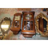 Two oak 1930's pendulum wall clocks,