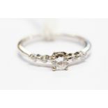 A diamond solitaire, claw set, round brilliant cut diamond, approx weight 0.