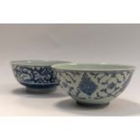 Two blue and white Chinese bowls, both having character marks to the base,