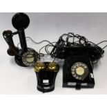 A mid 20th Century spin dial black Bakelite telephone, with address tray,