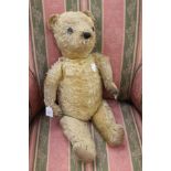 Yellow straw jointed Teddy Bear