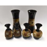 Collection of black and brown ground Langley vases,