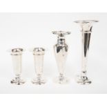 A pair of Edwardian silver trumpet shaped squat vases, flared edges, Birmingham 1908, 11 cms high,