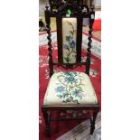 An early Victorian high backed chair,