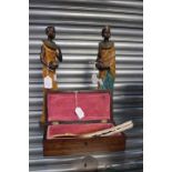 Two African figures treen box with contents inlaid