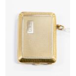 A 9ct gold match vesta case, machine engraved top with Greek key border, inscribed J.